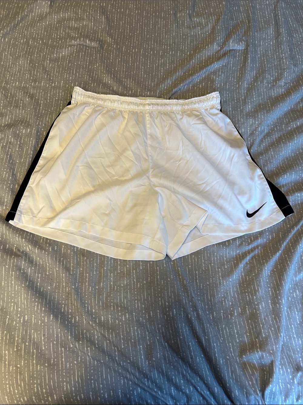 Nike Women's White Athletic Shorts with Black Side Panels